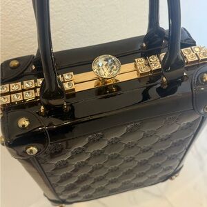 Elegant Black Mini Bag with Gold Accents
